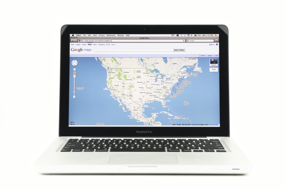 Google Maps displayed on a 13"" Macbook Pro laptop, placed on a white background."